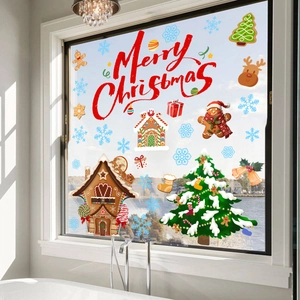 Merry Christmas window static stickers featuring gingerbread house and reindeer on glass