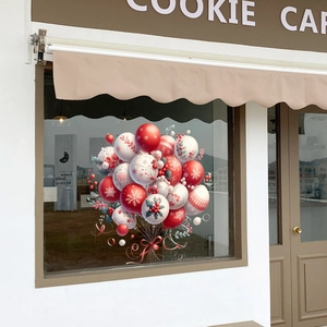 Detail of festive Christmas window stickers with red and white balloon holiday patterns