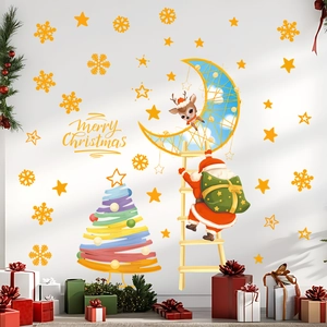 Luminous Christmas wall stickers with Santa, reindeer and stars on a white wall