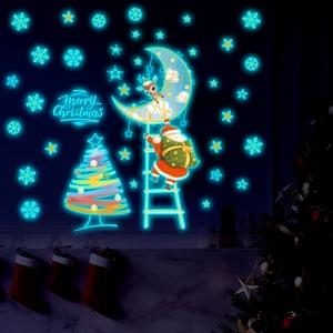 Luminous Christmas wall stickers with glowing Santa, reindeer and stars for home decor