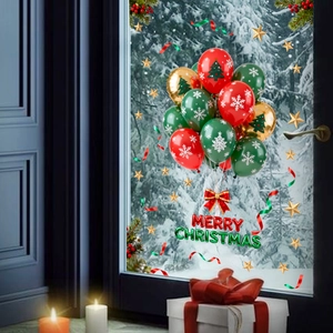 Detail of red and green Merry Christmas letter balloons with festive snowflake latex balloons