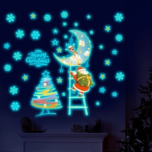 Luminous Christmas wall stickers with glowing Santa, reindeer, and stars on a wall