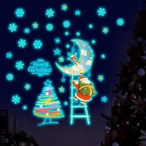 Glow in the dark Christmas wall stickers featuring Santa, moon, and luminous stars