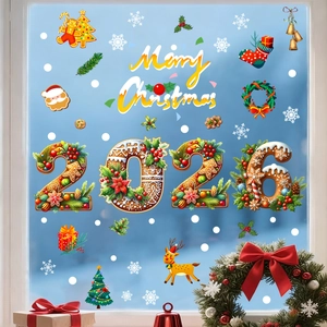 Close-up of 2026 Christmas window clings featuring gingerbread reindeer and snowflake motifs
