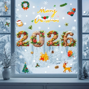 Detail of 2026 Gingerbread style Christmas window stickers with festive snowflakes on glass