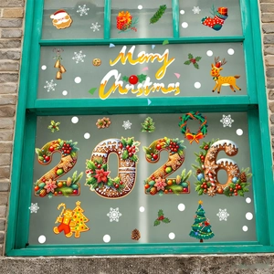 Detail of Christmas window stickers featuring 2026 gingerbread numbers and reindeer motifs
