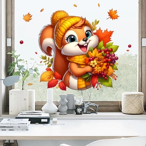 Detail view of cute squirrel window sticker with autumn maple leaves for holiday decoration