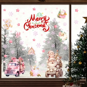 Gros plan d'autocollants 3D Père Noël rose et Merry Christmas pour décoration de vitrine