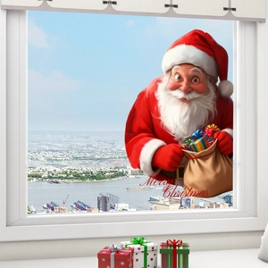 Detail of Santa Claus window sticker with Merry Christmas text on glass pane