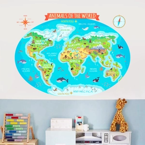 Detail of world map wall sticker with colorful animals in a cozy kids room decor