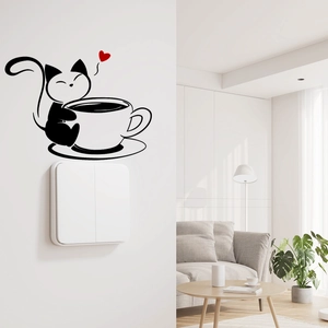 Cat and coffee cup silhouette wall sticker placed above a modern white light switch