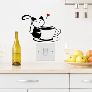 Creative black cartoon cat with coffee cup and heart wall sticker over a light switch