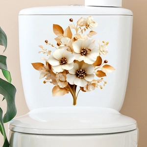 Detailed view of floral 3D wall decal on a white ceramic toilet tank with gold leaves