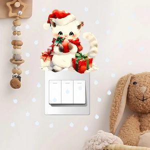 Christmas cat wall sticker with Santa hat and gift box on a white light switch