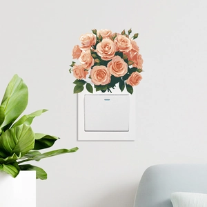 Detail showing self-adhesive pink rose floral wall sticker on a white light switch