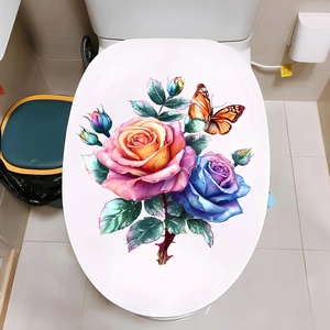 Floral toilet lid sticker with pink and blue roses and an orange butterfly on white lid