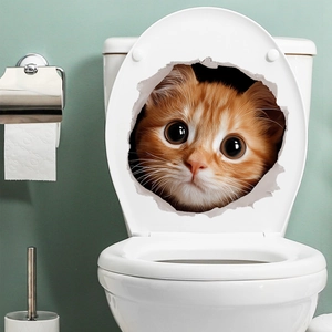 Detail view of 3D orange cat wall sticker peering through cracked hole on toilet lid