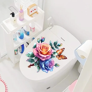 Detail view of realistic floral toilet lid decals featuring roses and orange butterflies