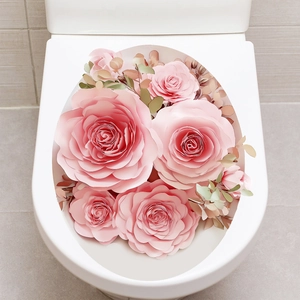 Dettaglio di adesivi 3D con rose rosa impermeabili su un sedile del WC bianco