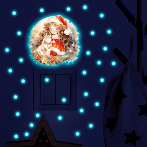 Luminous wall stickers set showing glowing Christmas girl, deer, and blue stars in dark room