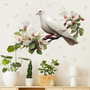 Creative wall sticker featuring a white bird on blooming branches for home wall decor