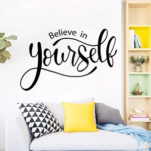 Detail view of Believe in yourself black wall decal sticker in a modern living room