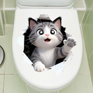 Adesivo 3D per WC con simpatico gattino grigio dagli occhi a stella che rompe la parete