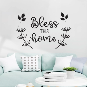 Inspirational Bless THIS home wall decal with floral accents on a white living room wall