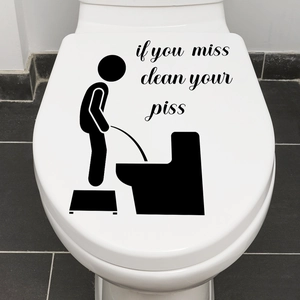 Détail d'un autocollant créatif noir pour toilettes en vinyle avec texte humoristique