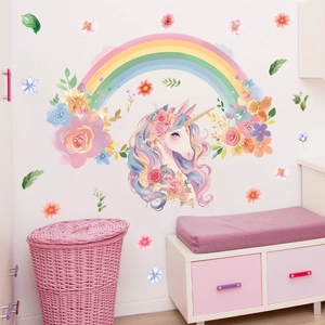 Cartoon unicorn wall stickers with rainbow and flowers for a dreamy girls' bedroom decor