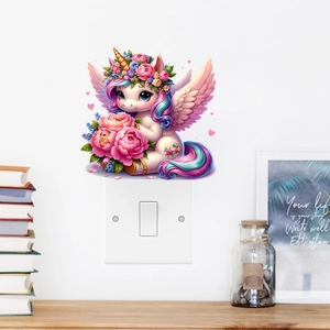 Cute cartoon unicorn wall sticker with pink wings and rainbow mane for kids' bedroom decor