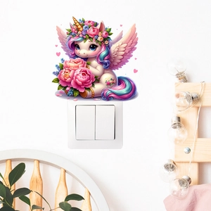 Close-up of cute unicorn wall sticker with pink wings and floral crown above light switch