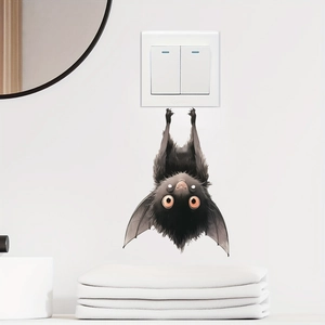 Cute cartoon bat wall decal for living room decoration near white light switch