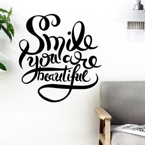Inspirational Smile you are beautiful wall decal sticker above sofa in a modern living room
