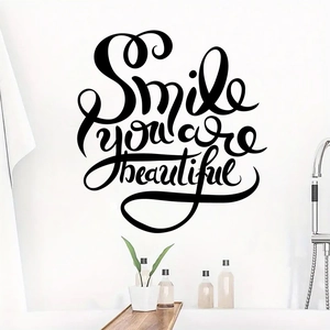Close-up of Smile you are beautiful inspirational wall decal in a bathroom setting