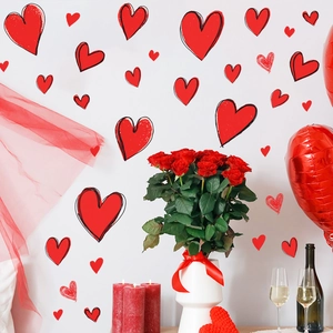 Red heart wall decals set for romantic bedroom decor and Valentine's Day party supplies