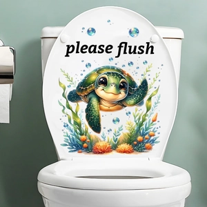 Close-up of sea turtle toilet lid sticker with coral and Please Flush reminder text
