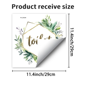 Close-up of green leaves and gold frame toilet decal with 11.4 inch size markings