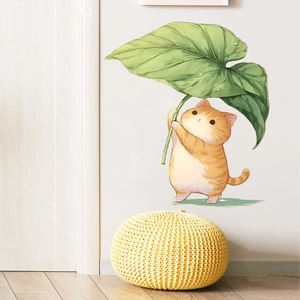 Cute orange tabby cat wall sticker holding a giant green leaf umbrella for home decor