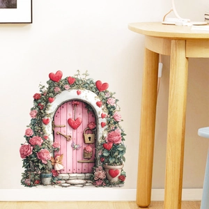 Dettaglio dell'adesivo murale con porta rosa, rose e cuori per un arredo romantico