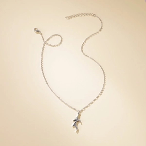 Detailed view of gothic silver wing pendant with adjustable chain and lobster clasp