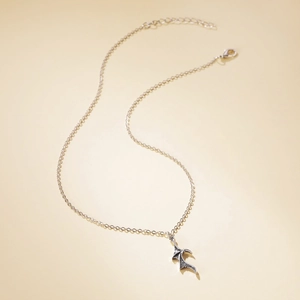 Detail view of gothic dragon wing necklace with vintage silver finish and lobster clasp