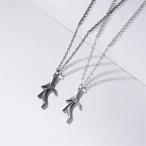 Gothic vintage metal wing necklace set for couples in black and silver finishes