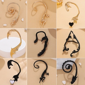 Gothic dragon and bat wing non-piercing ear clips in black and gold alloy finish
