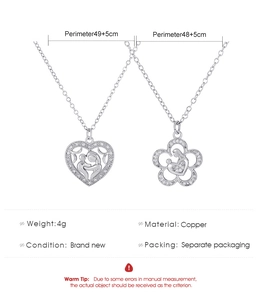 Detail view of silver heart and flower pendants with mother-baby design and dimensions