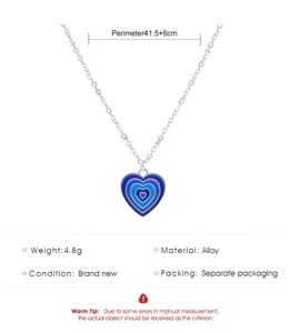 Macro detail of heart enamel pendant necklace with size 41.5+6cm and weight 4.8g