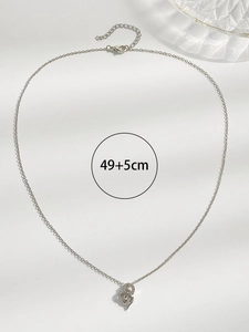 Detailed view of silver heart pendant with cubic zirconia and 49+5cm chain specs