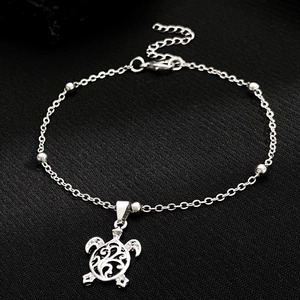 Bracelet de cheville tortue argenté avec motifs ajourés et cristaux scintillants fins
