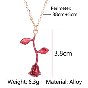 Detail view of red rose pendant necklace with alloy chain and specific size measurements