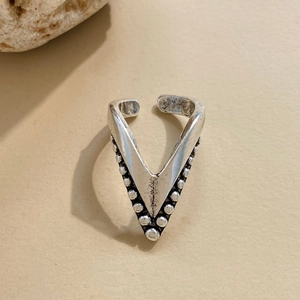 Vintage silver V-shaped open ring with beaded edge and minimalist bohemian style design